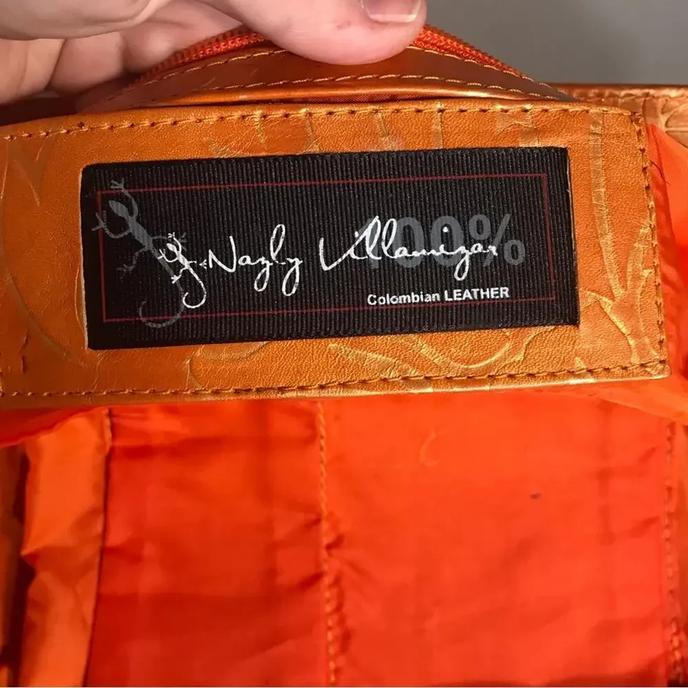 Colombian designer Nazly Villamizar lrg Leather clutch purse orange gold accent